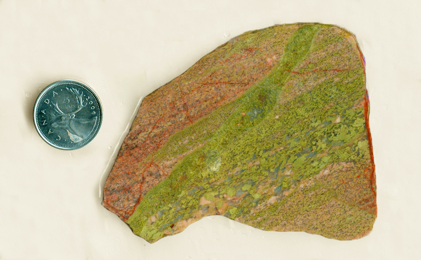 Pink and green flowing colors in a slab of Unakite (Feldspar, Epidote and Quartz) from Rhodesia.