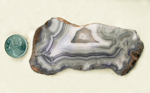 Purple, violet, gray and white Parcelas Agate from Mexico with a bold fortification pattern.