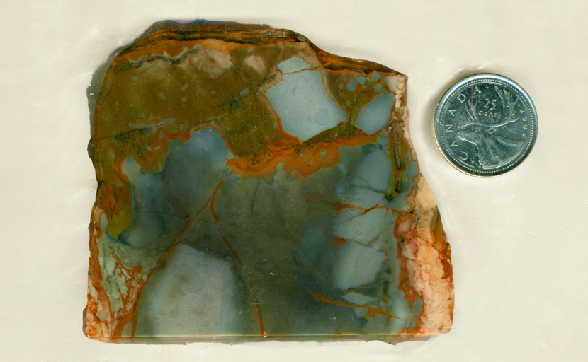Blue, orange, green and yellow slab of Rocky Butte Jasper from Oregon.