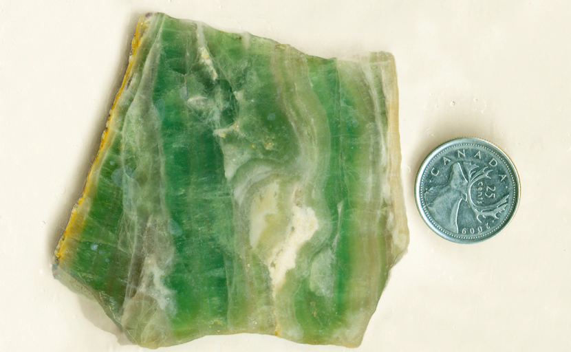 Strong translucent green stripes in a slab of Fluorite from Colorado.