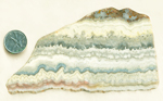 Blue, red and gold slab of Mexican Dogtooth Lace Agate from Mexico, with tooth and lace patterns.