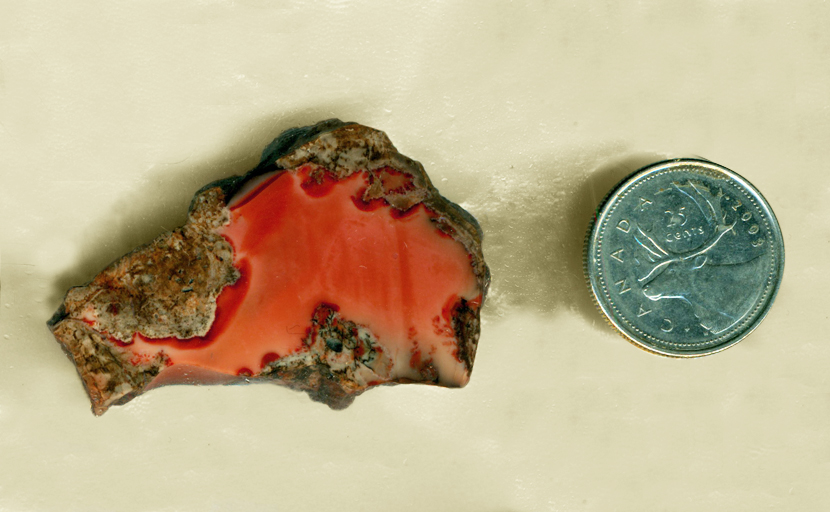 Pinkish-orange end-cut slab of Morrisonite from Oregon.