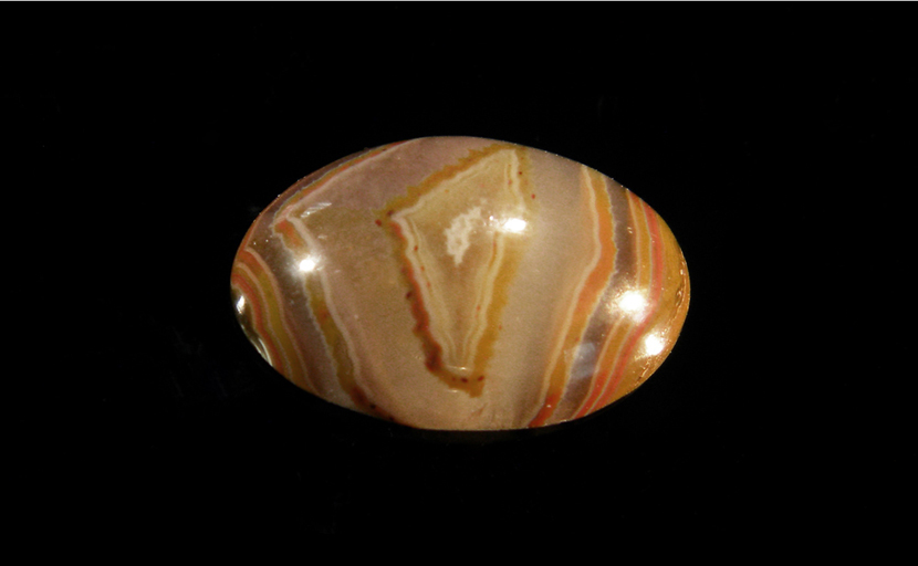 Calibrated polished Fairburn Agate from Nebraska or South Dakota, with opaque concentric stripes suspended in translucent chalcedony.