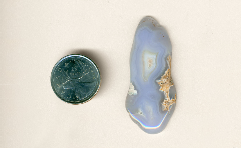 Freeform polished Mexican Blue Agate, with 2 patterns of blue fortifications and creamy details.