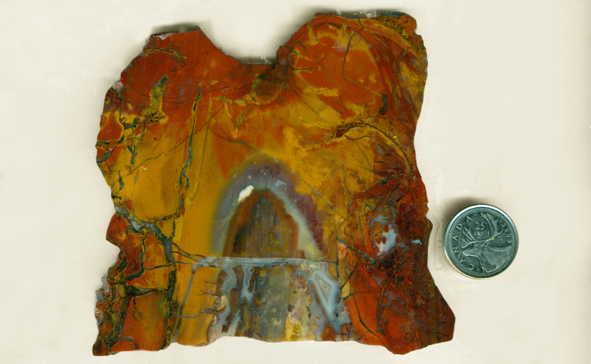 Red, yellow and blue patterned slab of Vacquilla Jasp/Agate from Mexico.