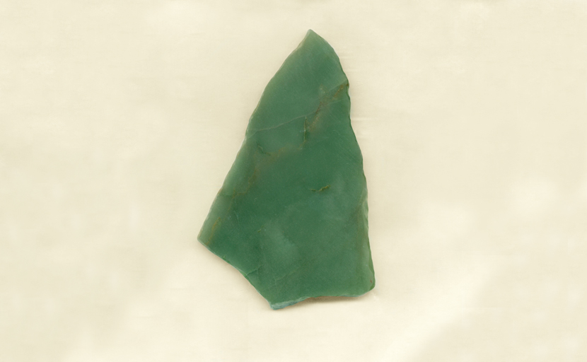 An arrowhead shaped slab of bright green Aventurine from India.