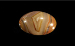Calibrated polished Fairburn Agate from Nebraska or South Dakota, with opaque concentric stripes suspended in translucent chalcedony.