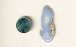 Freeform polished Mexican Blue Agate, with 2 patterns of blue fortifications and creamy details.