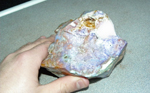 Blue, purple and red patterned rough Mexican agate.