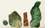 3 slabs of Green and Red Jasper, with lines like forest shadows and details of other colors.